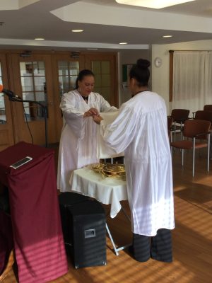 Preparing for Communion during Sunday Church Service located in Park Forest, Illinois